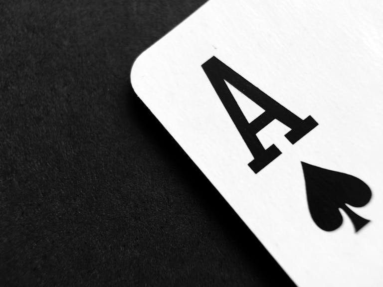 Detailed view of an Ace of Spades card symbolizing luck and strategy.